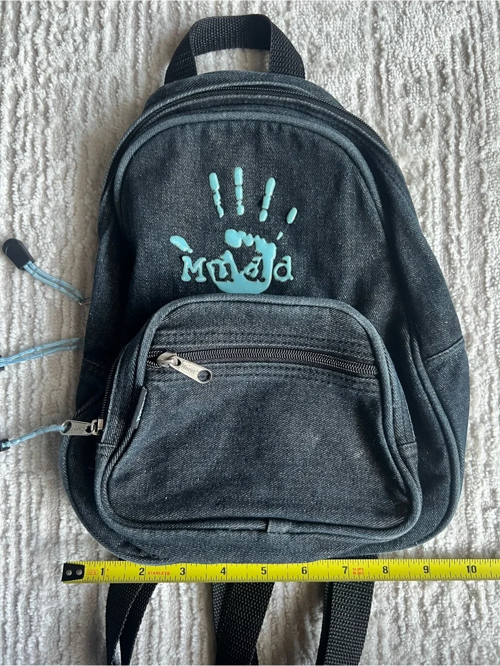 Mudd Black Backpack with Teal Handprint Accent